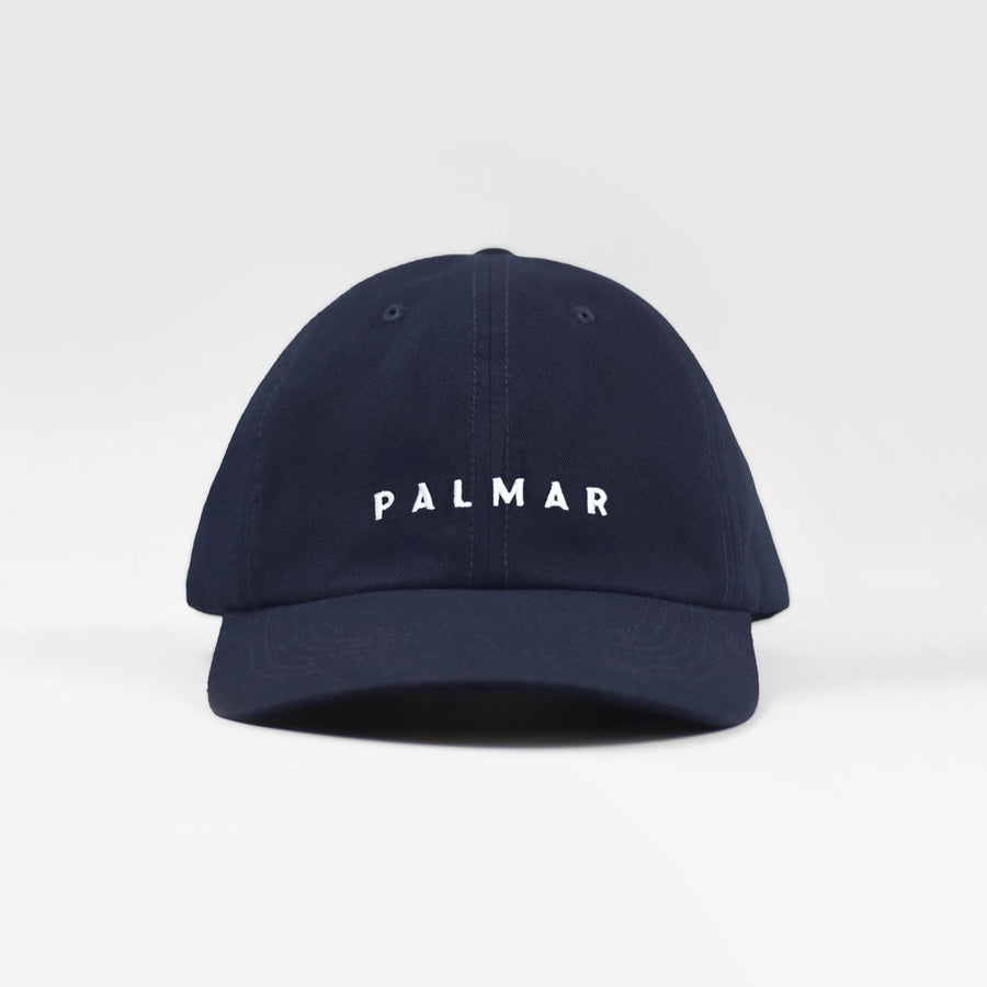 Granatowa czapka z daszkiem z logo Palmar. Navy blue baseball cap with Palmar logo.