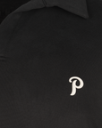 Białe logo na koszuli polo. White printed logo on left chest.